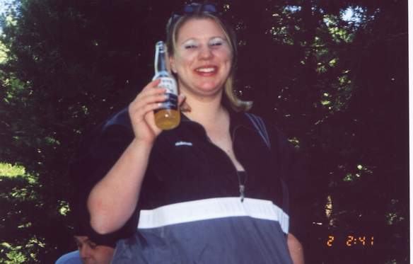 A woman mountain biking; Actual size=180 pixels wide